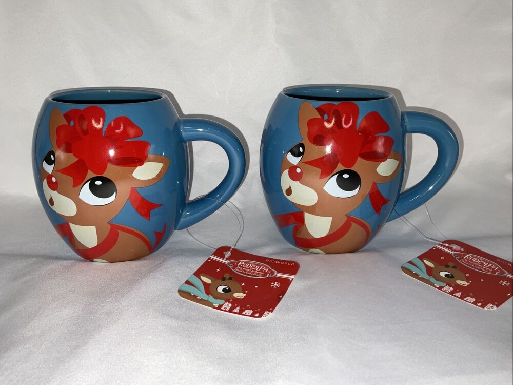 NWT BIOWORLD RUDOLPH RED NOSED REINDEER CHRISTMAS BLUE 16 Oz MUG CUP SET/2